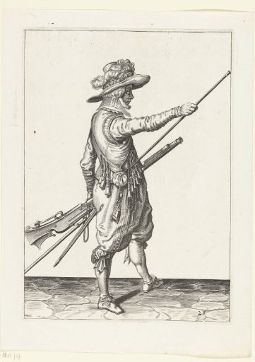 Soldier with a musket sliding his right hand toward the end of his ramrod