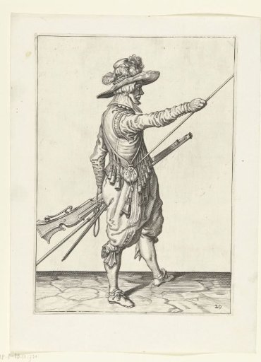 Soldier with a musket sliding his right hand toward the end of his ramrod