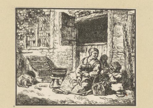 Woman and child sitting on the ground in front of a door cleaning vegetables