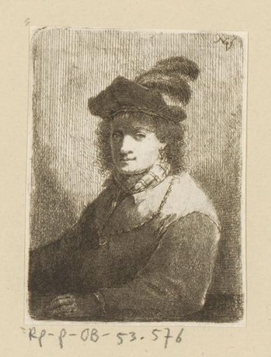 Man with a cap with feathers and a chain around his neck