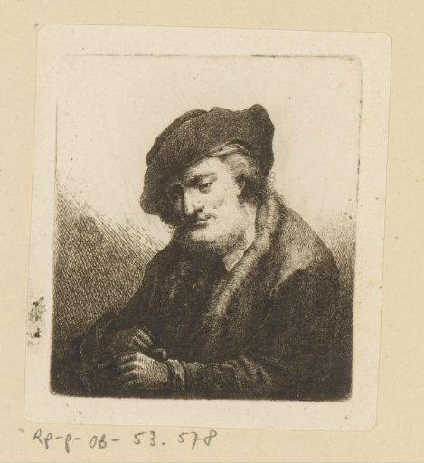 Man with a slanted beret leaning on a staff