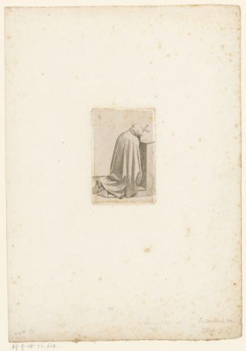 Praying monk seen from behind