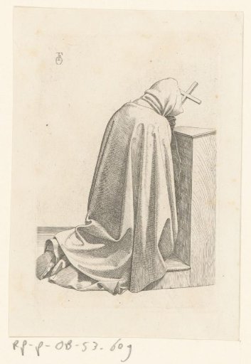 Praying monk seen from behind