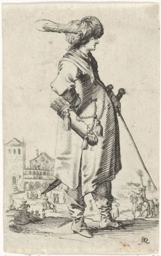 Standing man with a turban and a staff