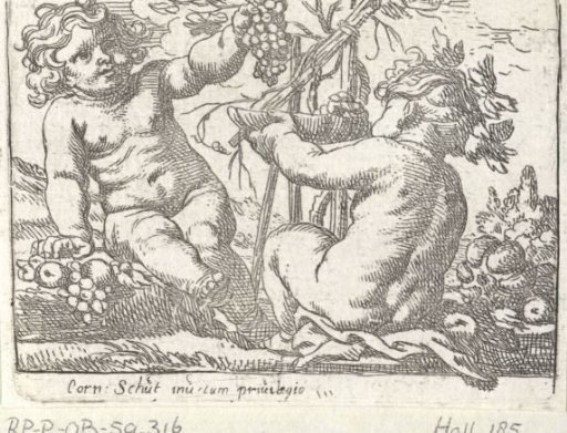 Two children with a bunch of grapes