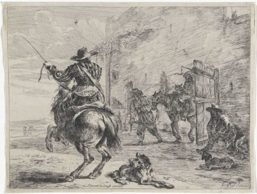 Rearing horse near a stable