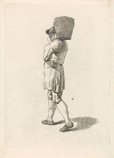 Man carrying a basket on his shoulder