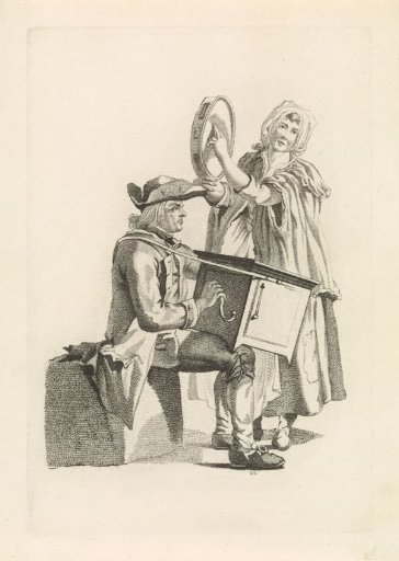 Organ grinder and woman with tambourine