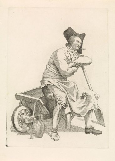 Man sitting on the edge of a wheelbarrow