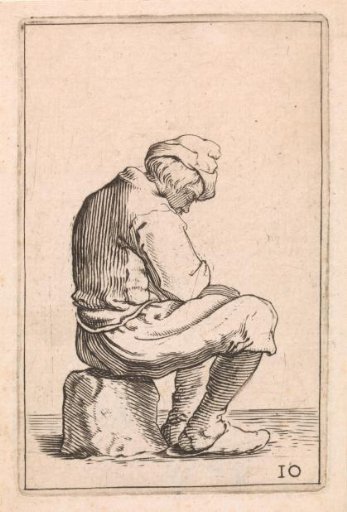Seated man with bowed head