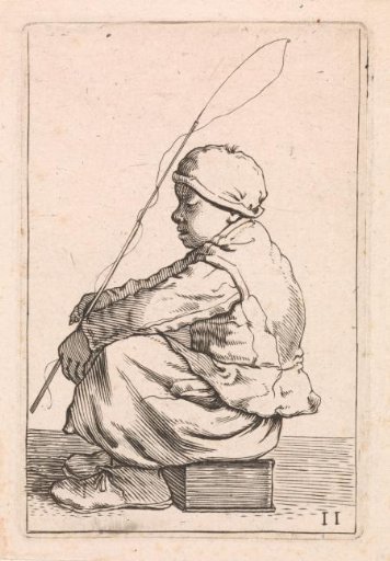 Seated boy with a fishing rod