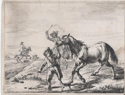 A boy leading a horse to the water