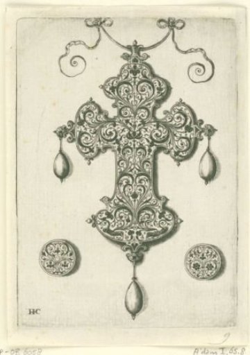 Back of a cross-shaped pendant