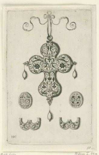 Back of a cross-shaped pendant