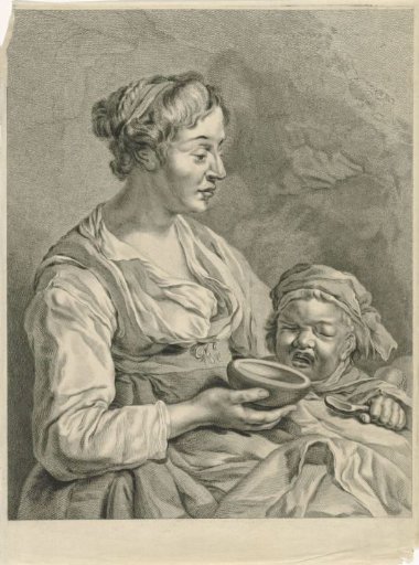 Mother feeding her child