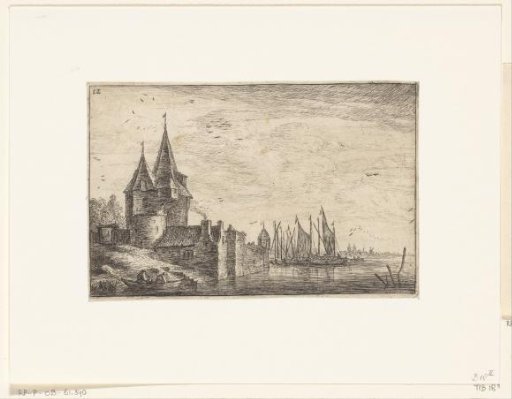 Building with pointed towers by the water