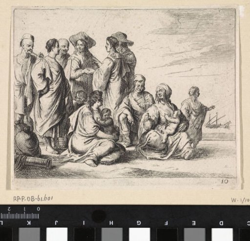 Men, women, and children on the beach