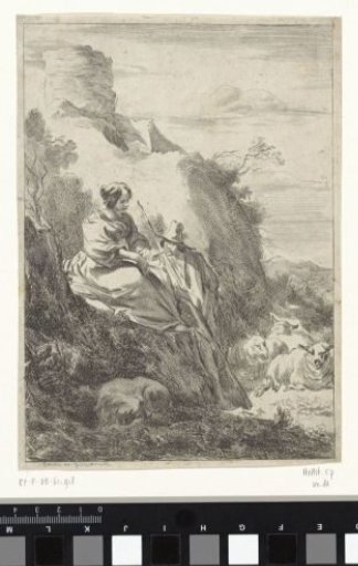 Shepherdess sitting and shepherd standing on a hill