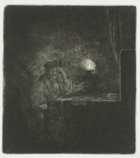 Student at a table by candlelight