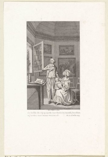Reinhart and his wife with their baby before a window