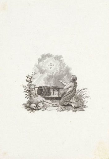 Young woman kneeling at a grave