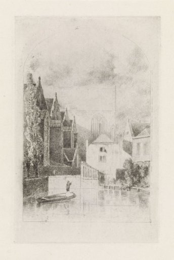 Man in a boat in a canal between houses