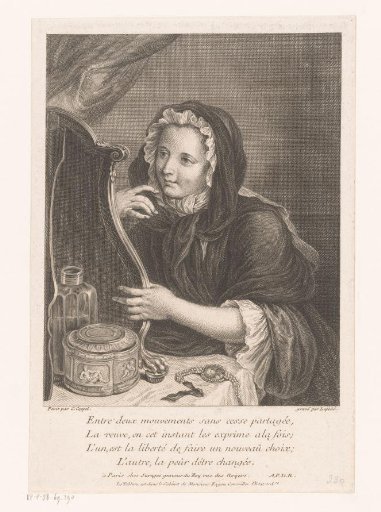 Young widow, sitting before a mirror at a dressing table