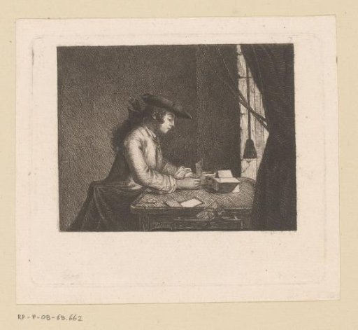 Young Man Building a House of Cards at a Table