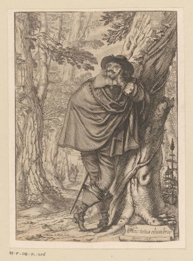 James Howell leaning against a tree