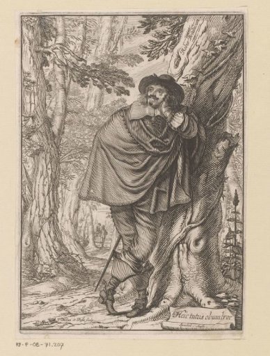 James Howell leaning against a tree