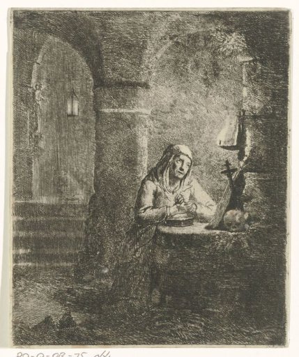 Praying woman before a crucifix and skull in a church