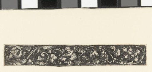 Leaf scrolls ending on the left in a mask