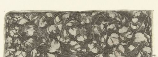 Leaf scrolls sprouting from both ends of the frieze