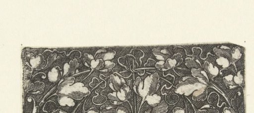 Leaf scrolls, sprouting from the center and from both ends of the frieze