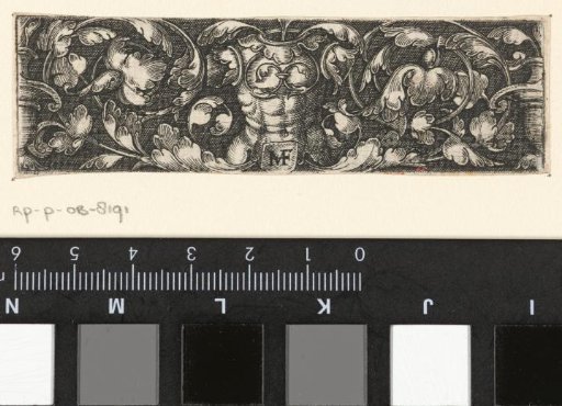 Frieze with a breastplate in the center