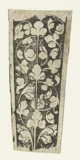 Knife handle decorated with volutes of leafy tendrils