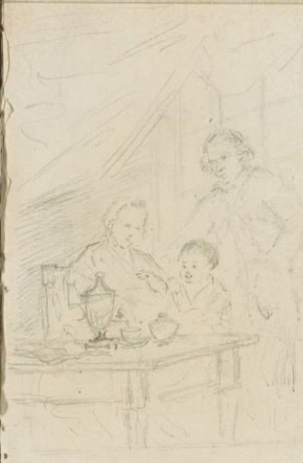 Parents and a child around a set table