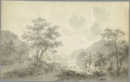 Small waterfall near a lake in a mountain landscape