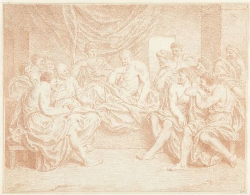 Old man in bed surrounded by persons