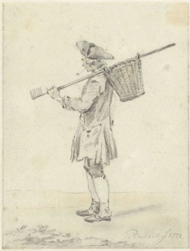 Standing man with a rake over his shoulder