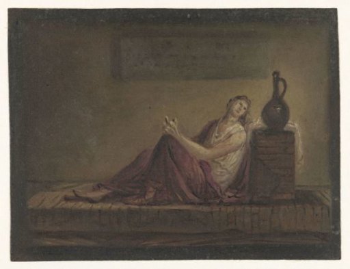Woman seated on her bed in a cell