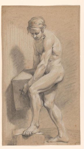 Standing male nude, lifting a block