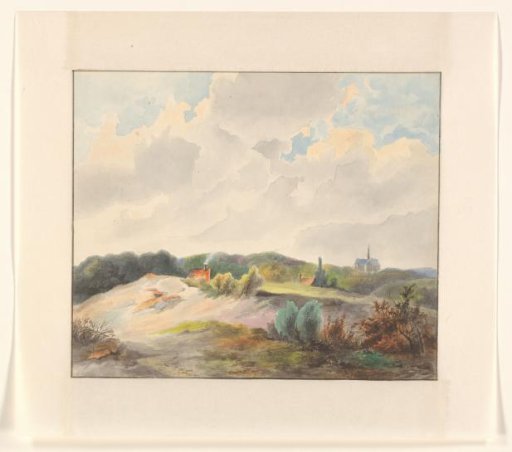 Dune landscape with houses and a church