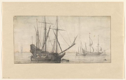 Sailing ships on calm water near the coast