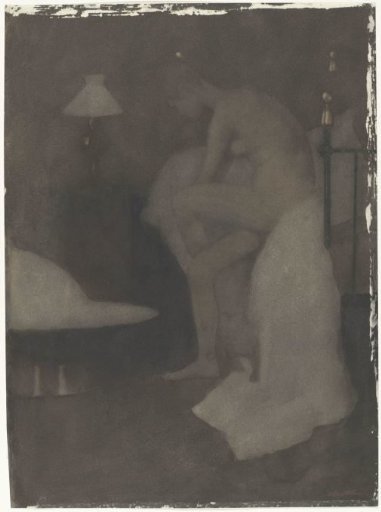 Naked woman, seated on the edge of the bed