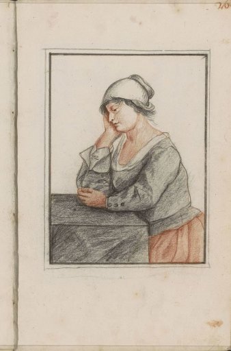 Woman leaning on a table with her elbow