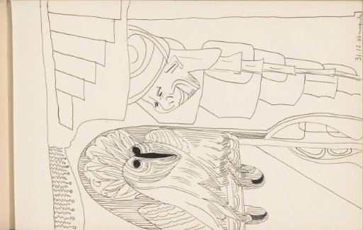 Woman with a turban on her head next to an owl on a stick