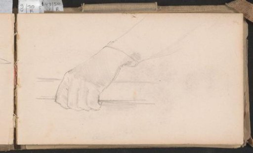 Hand holding a roll of paper