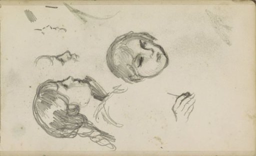Heads of two girls and a writing hand