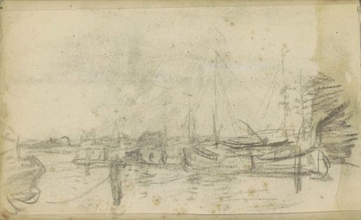 Sailing boats moored at a pier